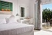 A Double Garden View room veranda, Santa Maria Village, Milos, Cyclades, Greece