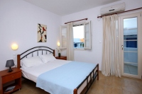Bedroom of an apartment  at Coralli Apartments, Livadakia, Serifos