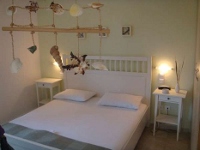 A bedroom at Indigo Rooms & Apartments, Livadi, Serifos
