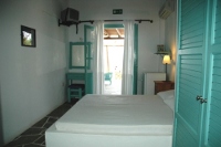 Bedroom’s private exit to the ground floor terrace, Styfilia Apartments, Platys Yialos, Sifnos